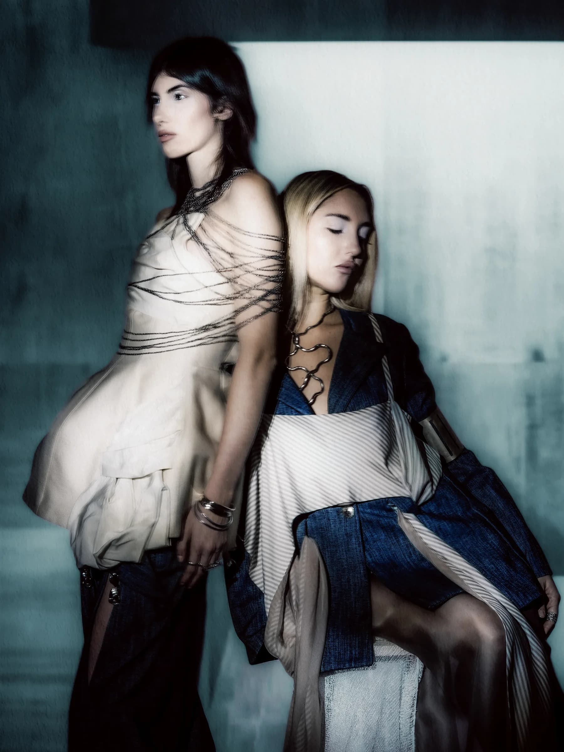 Constructed Stillness editorial, two models in sculptural garments